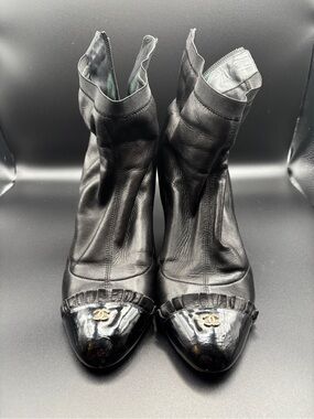 CHANEL Black Leather Cap-Toe Ankle Booties with Gold CC